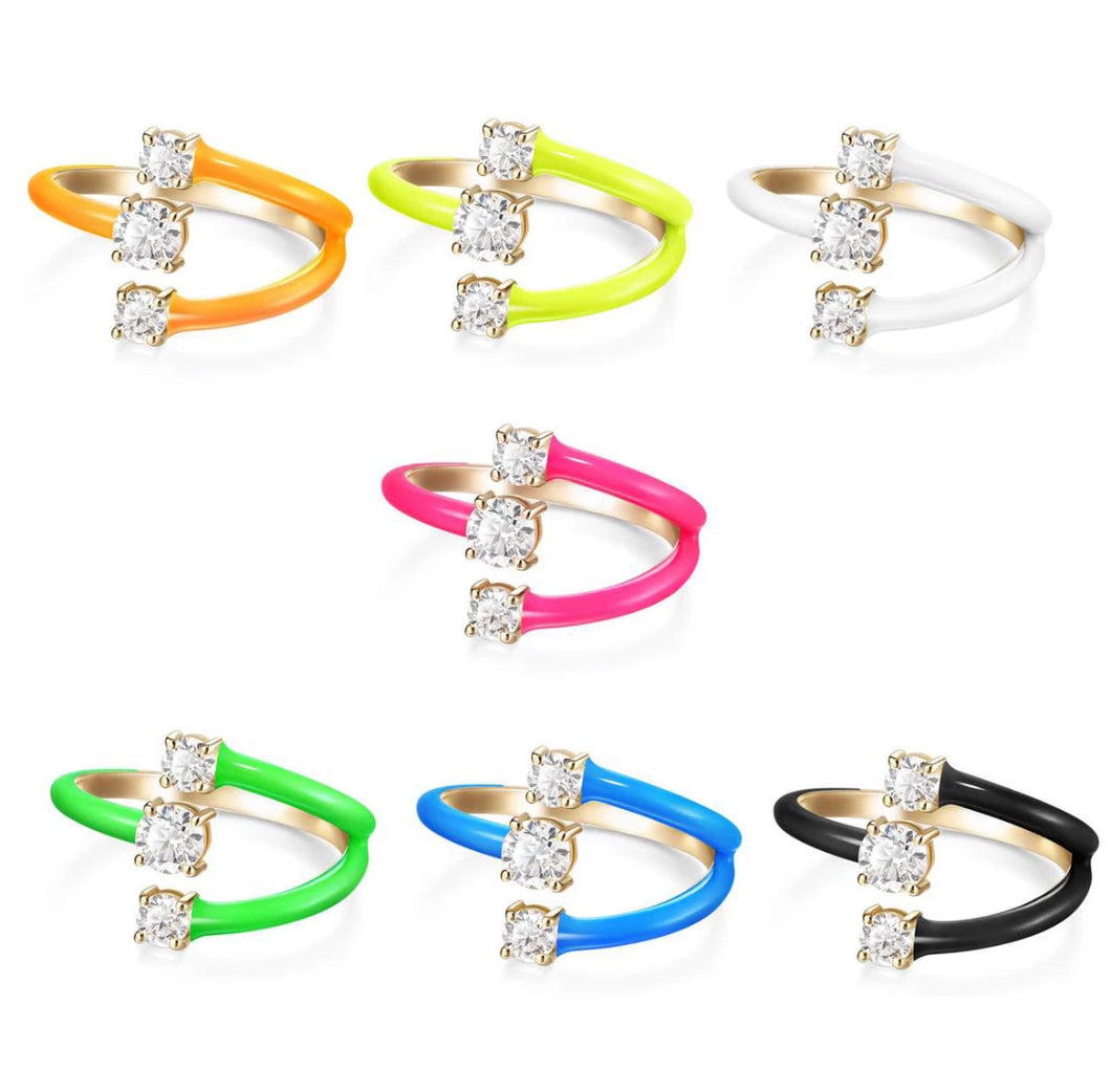 set of seven neon rings each with three layers and with three cubic zirconia each . 14 karat gold plated adjustable size fits most approximately ring sizes 3-9