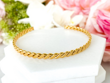 Load image into Gallery viewer, Gold twisted bangle bracelet
